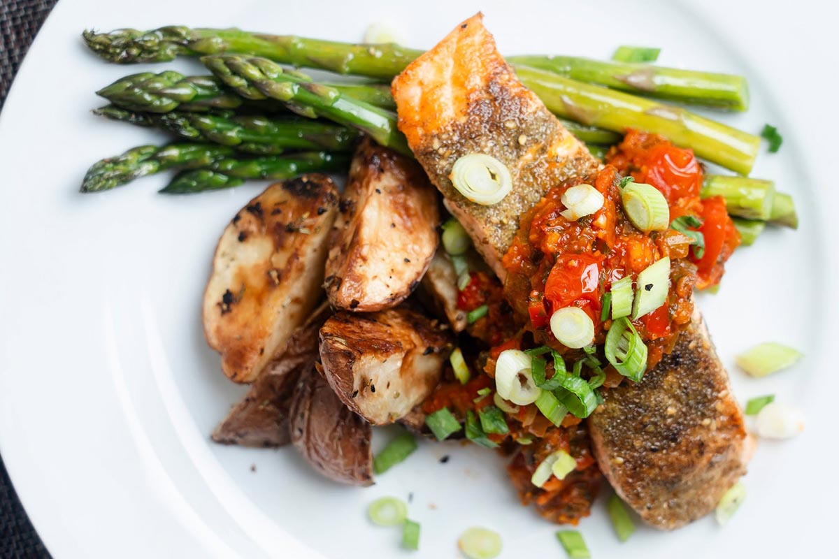 Bistro-933 – Moroccan-Salmon.jpg Moroccan salmon served on a bed of potatoes and asparagus at BIstro 933 in South Bend, IN